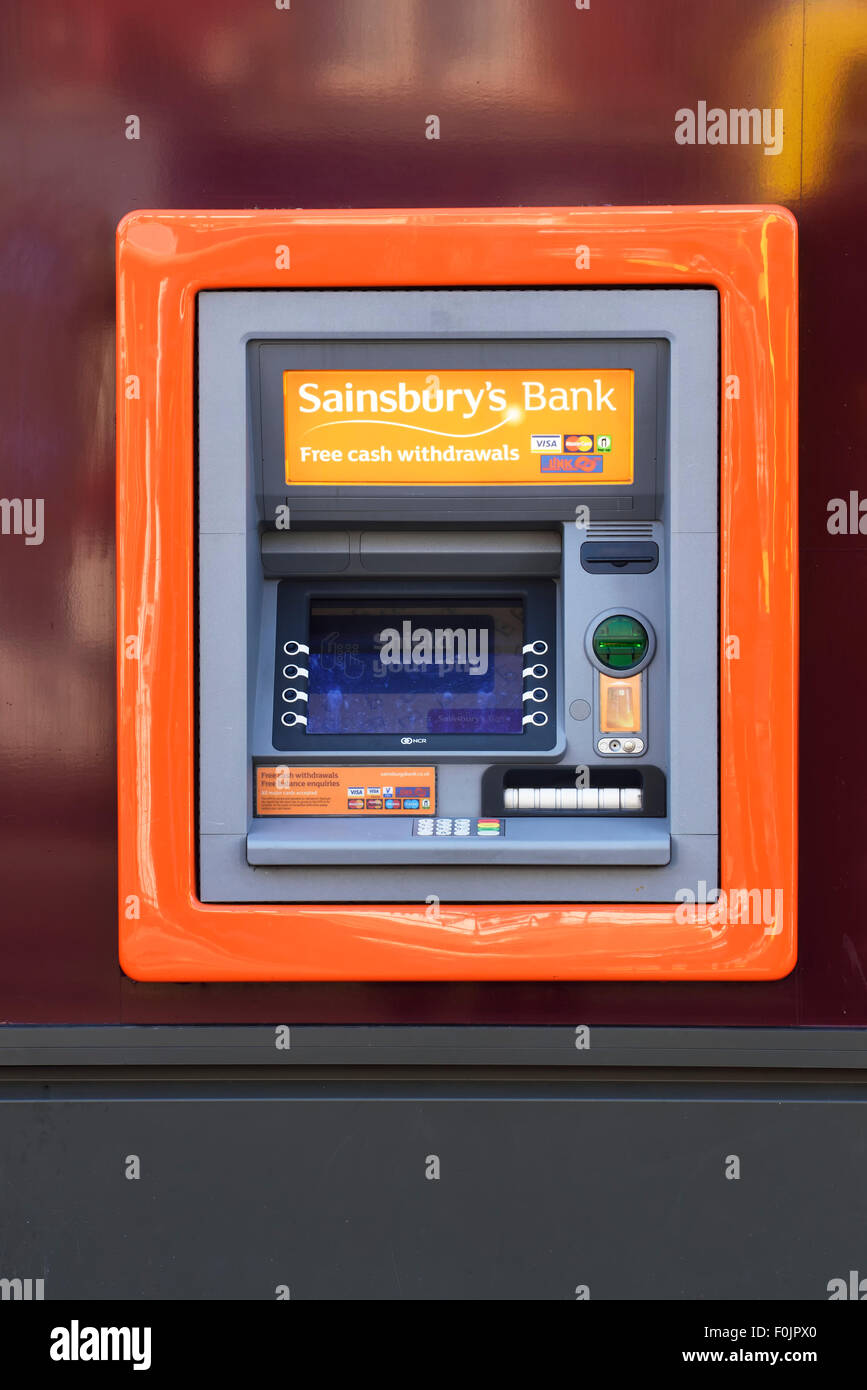 Sainsburys Cash Dispenser outside a shop in Lytham, Lancashire Stock Photo