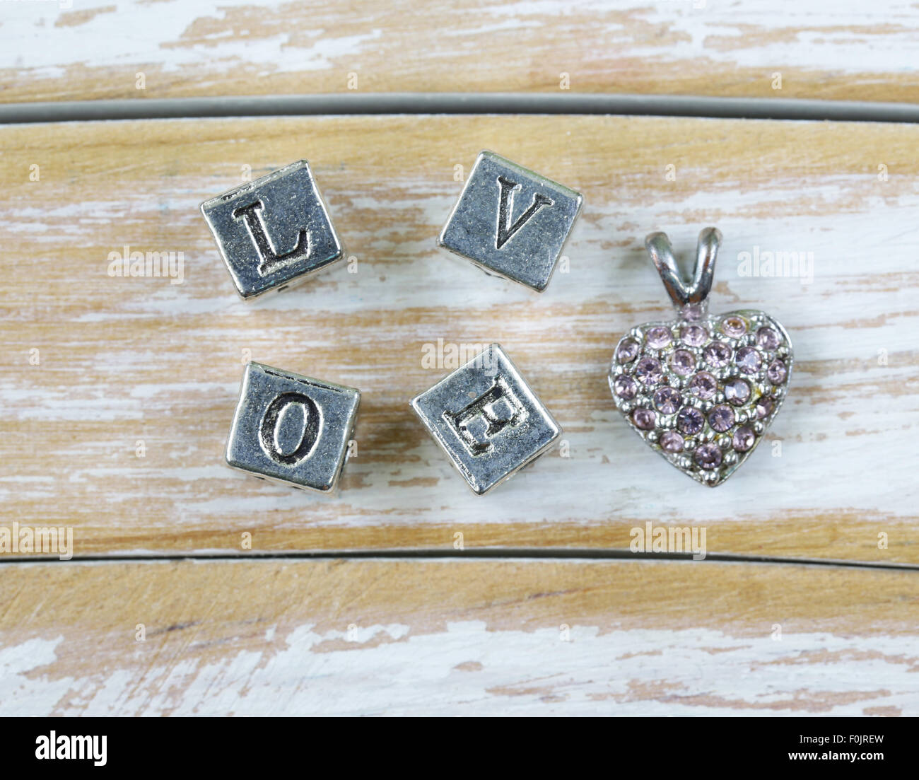 the word 'LOVE' written in metal letters Stock Photo