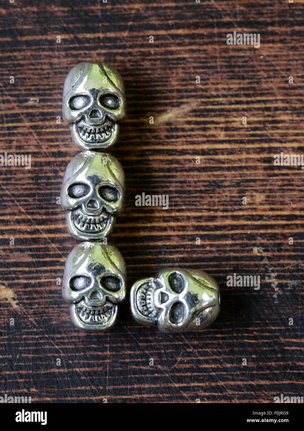 set alphabet of letters from metal skulls - word Halloween Stock Photo