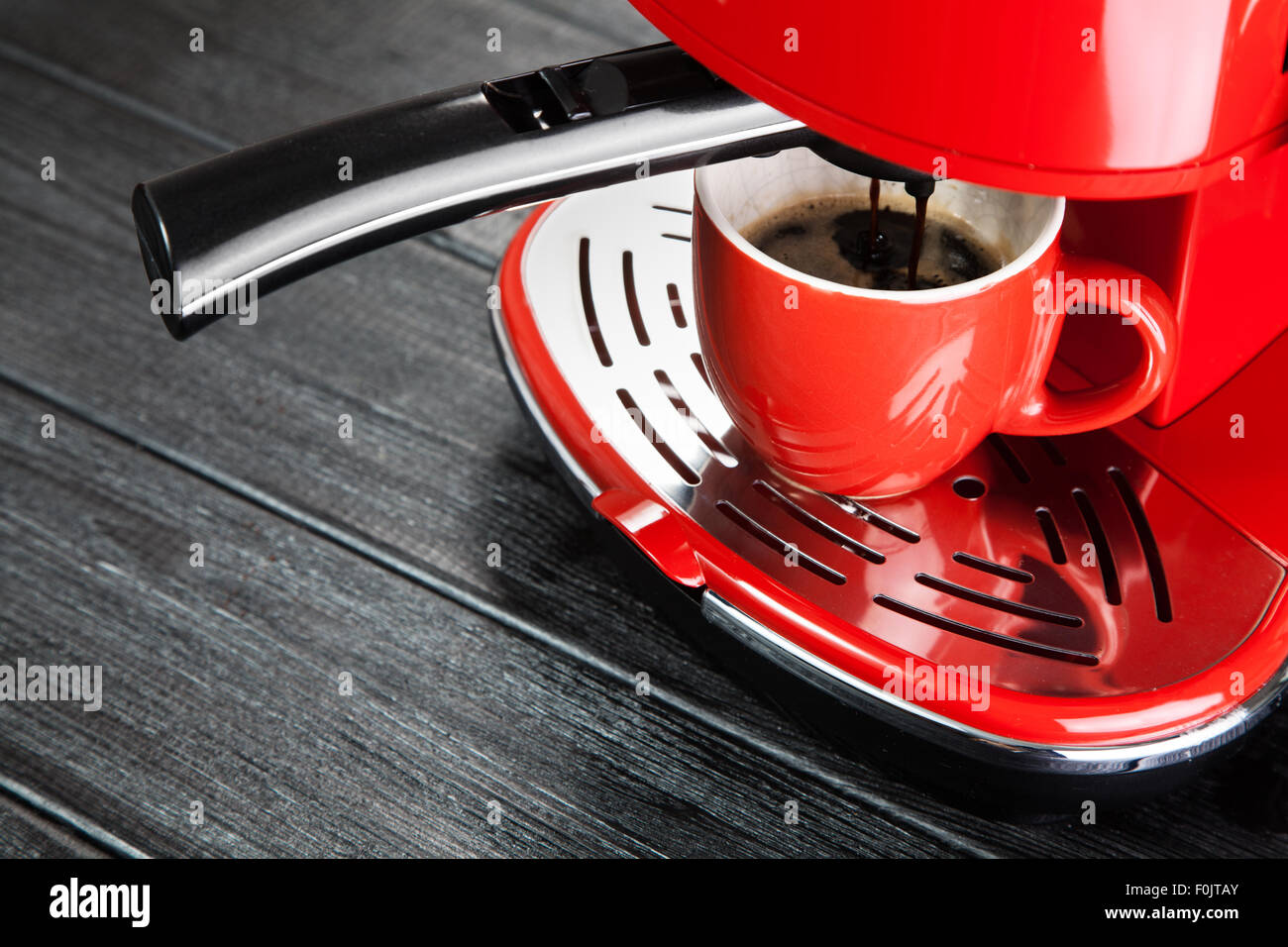 Red coffee machine Stock Photo - Alamy