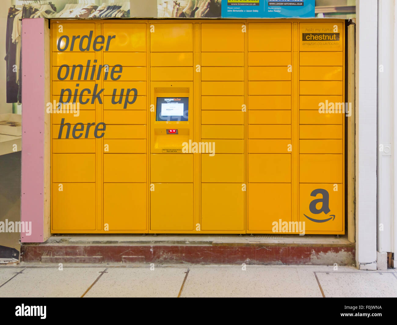 Chestnut an Amazon Locker for delivery of goods ordered on line in a shopping Arcade Stock Photo