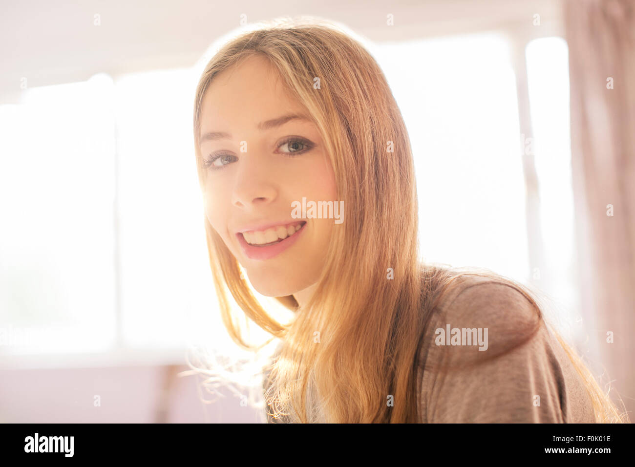 Portrait smiling blonde teenage girl Stock Photo