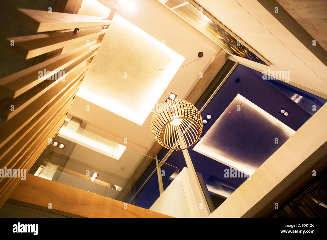 Illuminated Tray Ceiling And Modern Pendant Light Hanging In
