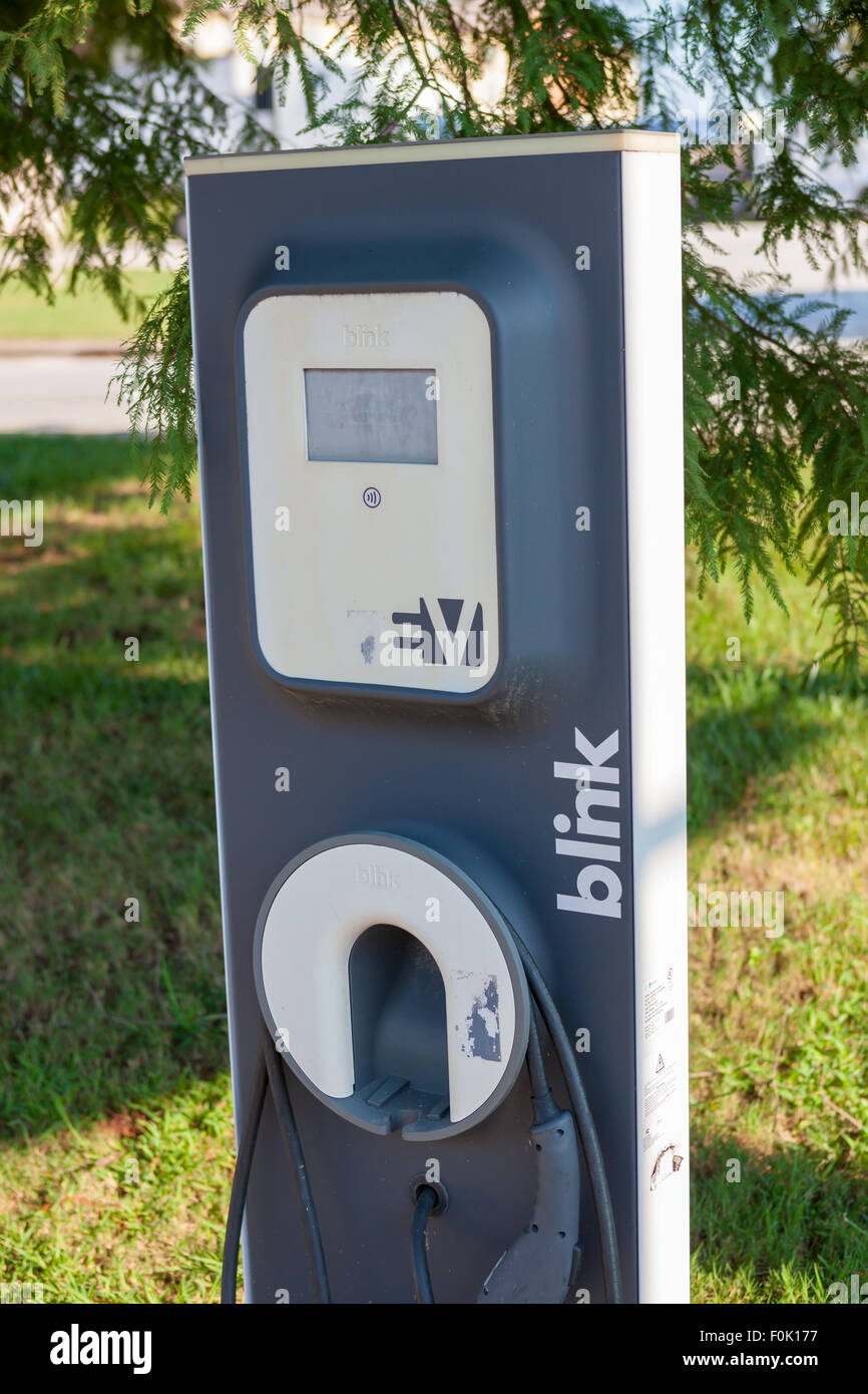A Blink EV charging station sits idle waiting for the next electric vehicle to be charged. Stock Photo
