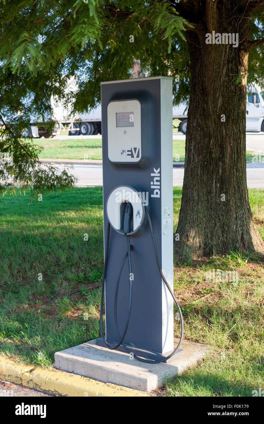 A Blink EV charging station sits idle waiting for the next electric vehicle to be charged. Stock Photo