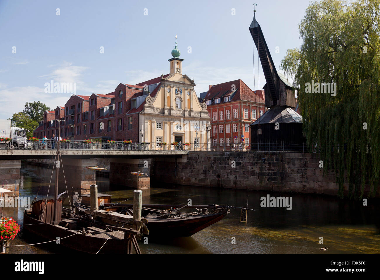 old harbour with treadwheel crane and Altes Kaufhaus, Hanseatic Town of Lüneburg, Lower Saxony, Germany Stock Photo