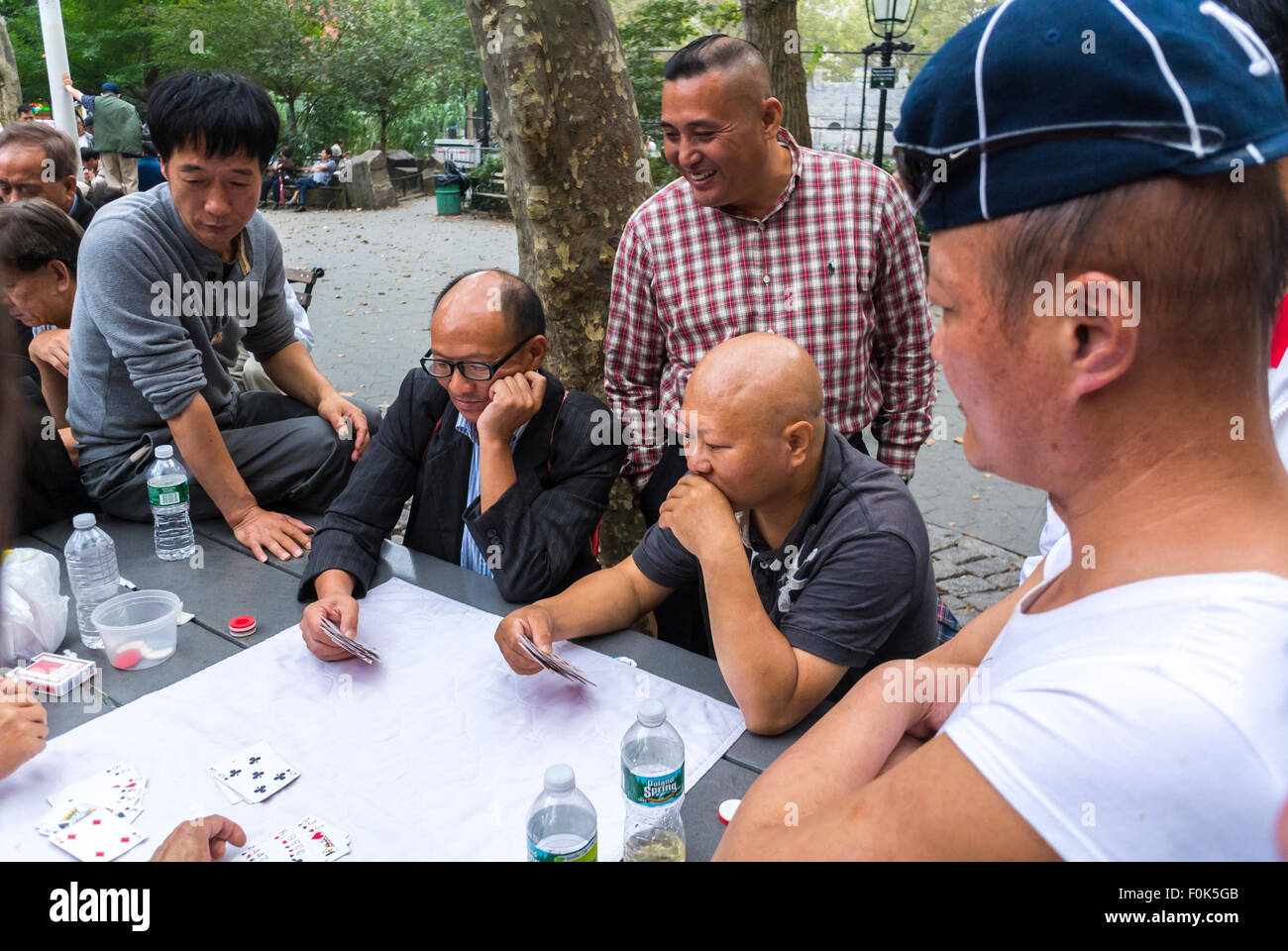 New York City, USA, Group Chinese Senior men, Playing Traditional Chinese Board Games in Chinatown District, in Public Park, immigrants usa Asian migrants in USA Stock Photo
