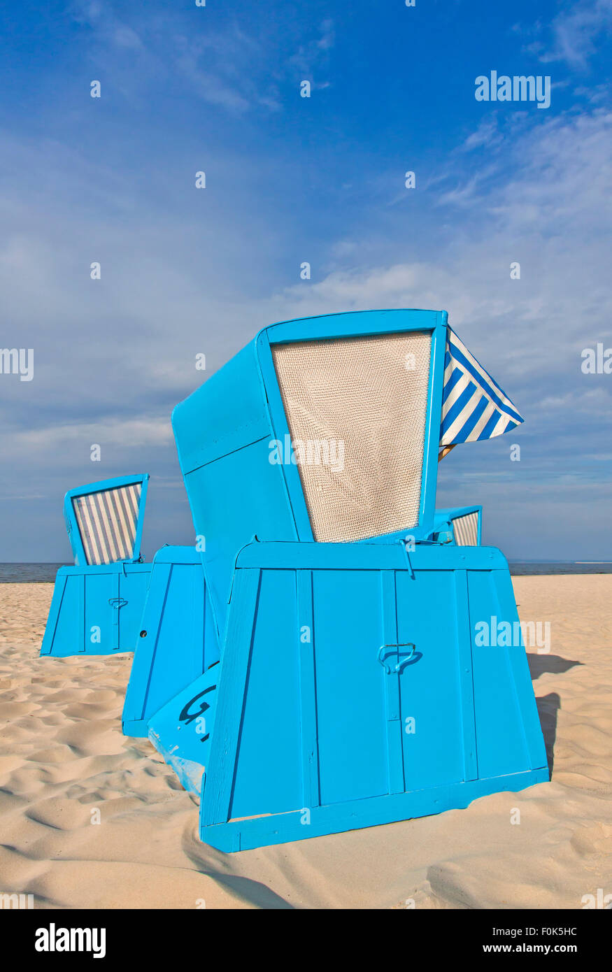 Hooded beach chairs (strandkorb) at the Baltic seacoast in Swinoujscie, Poland Stock Photo