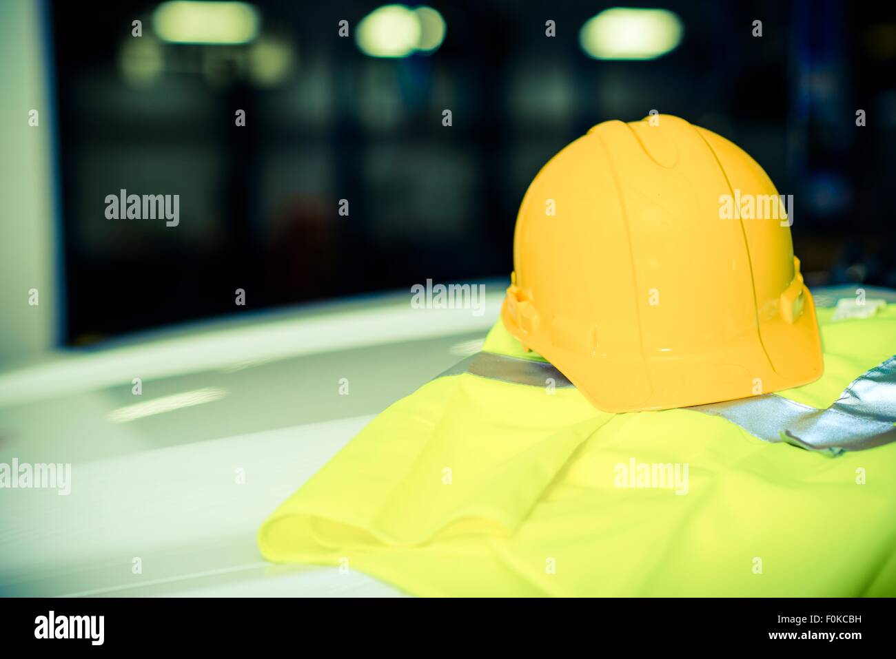 Yellow Construction Helmet Closeup Photo. Construction Safety Equipment. Stock Photo