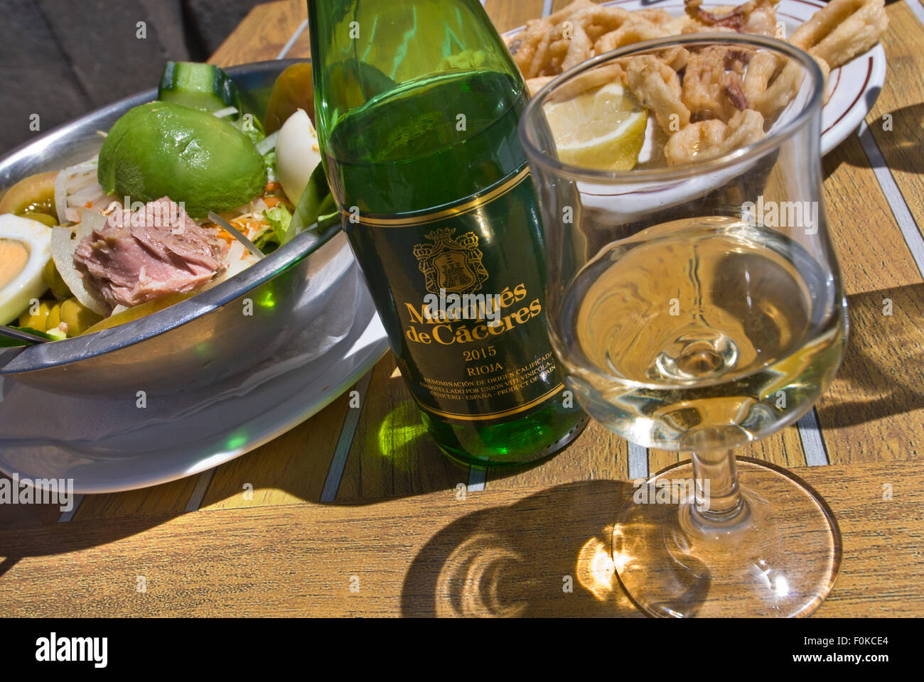 Alfresco restaurant table with popular fresh local simple rustic lunch ...