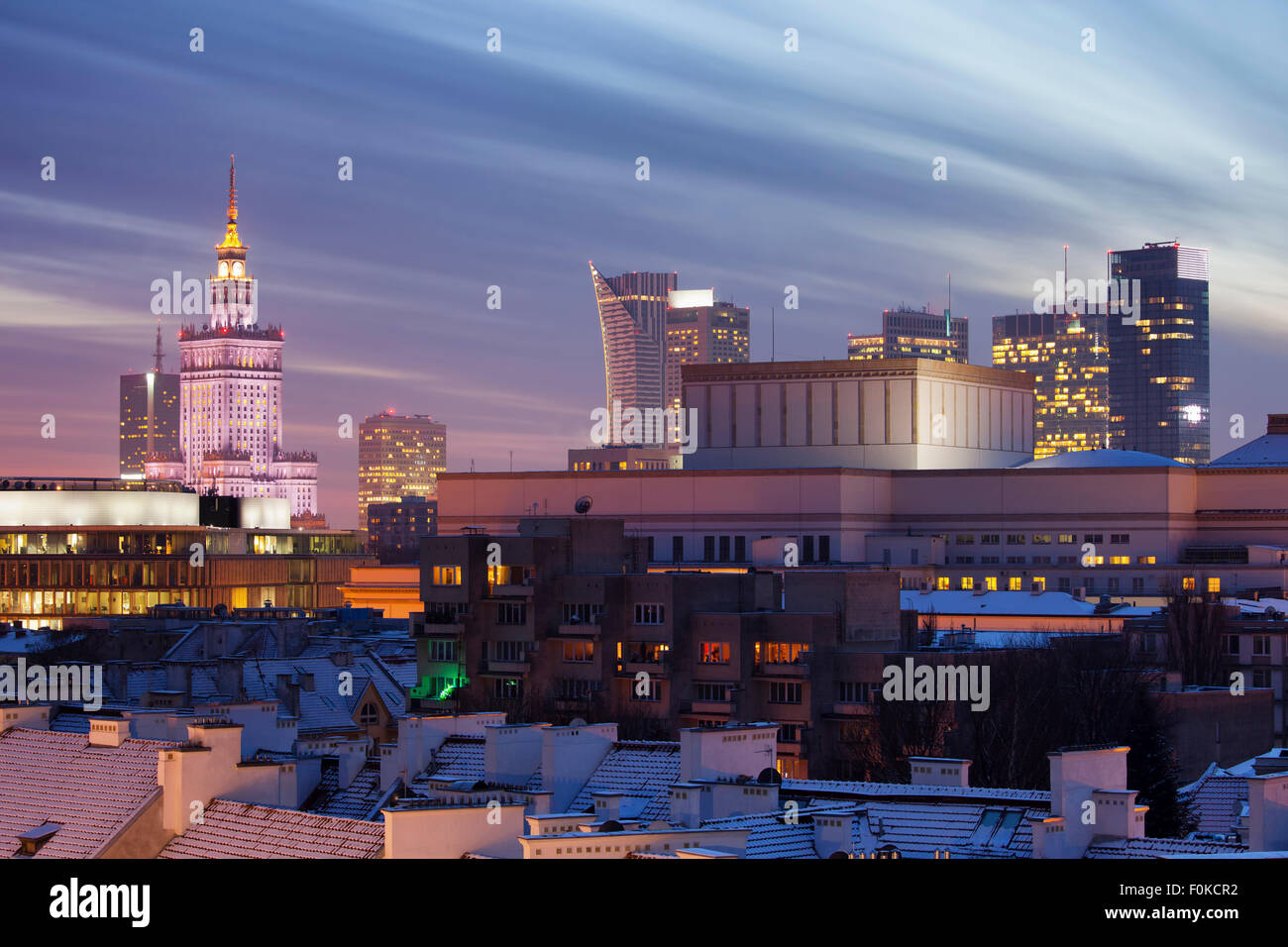Poland, Warsaw, view to skyline of city centre at evening twilight ...