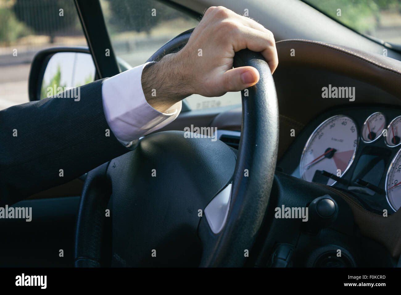 Hand Steering Wheel Car Close Up Stock Photos & Hand Steering Wheel Car