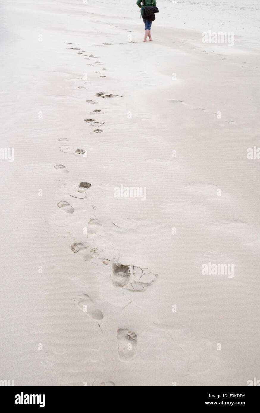 Woman feet in sand on hi-res stock photography and images - Alamy