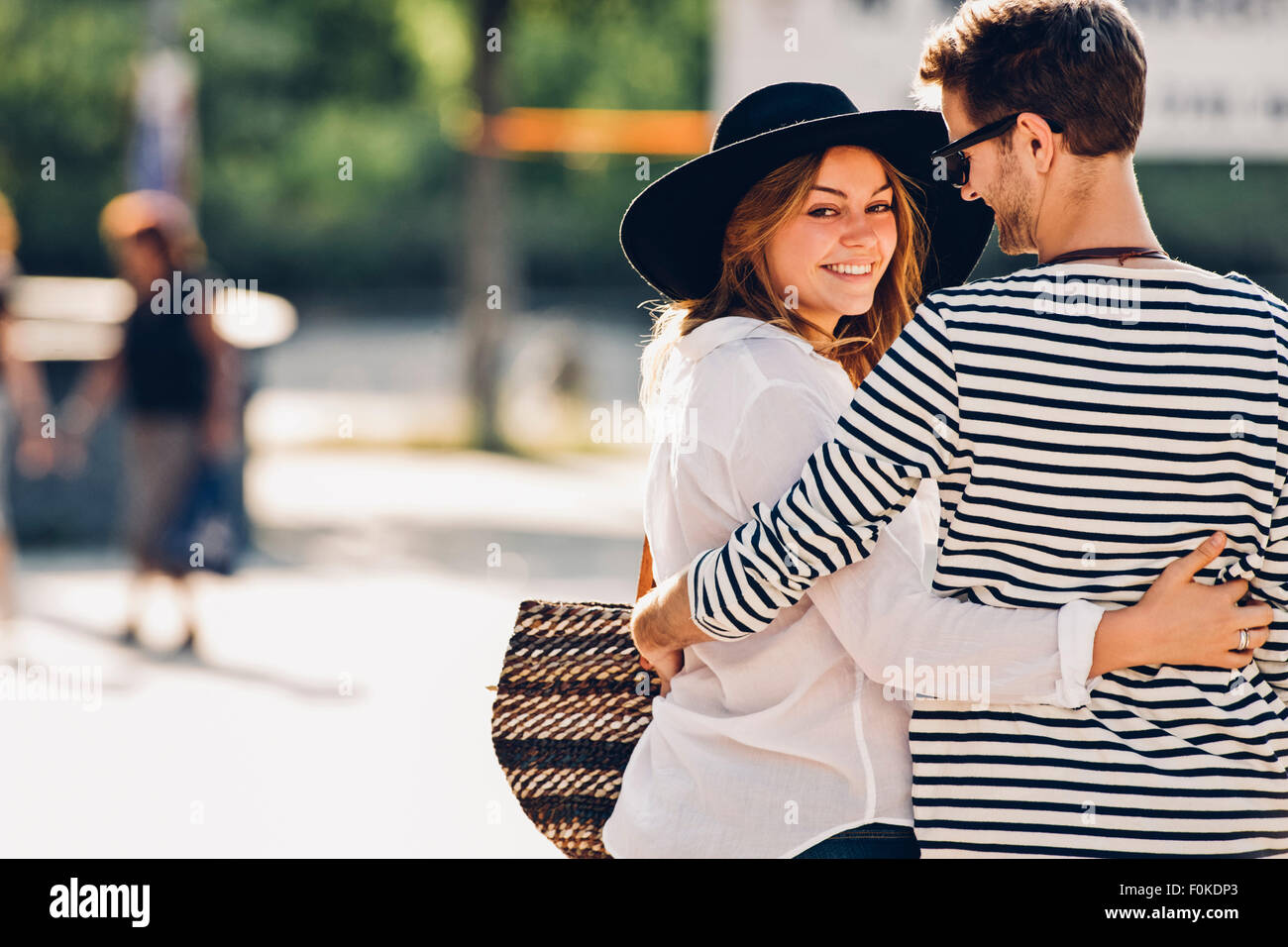 Young couple in love walking arm in arm Stock Photo Alamy