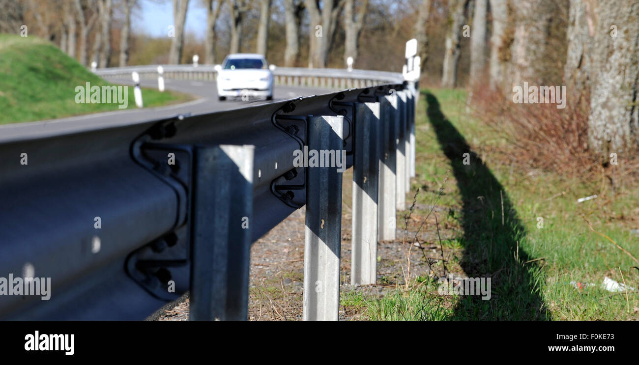 Rural Road with crash barrier and car, Eifel, Germany, Europe Stock Photo