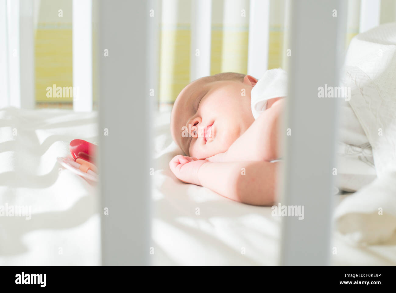 Girl sleeping in cot bed hi-res stock photography and images - Alamy