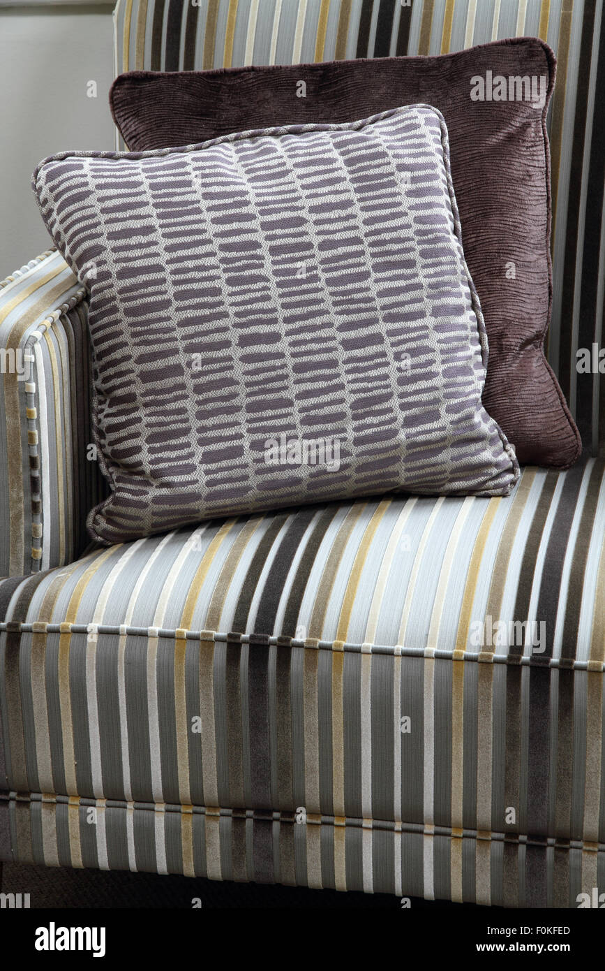 Striped easy chair with cushions Stock Photo