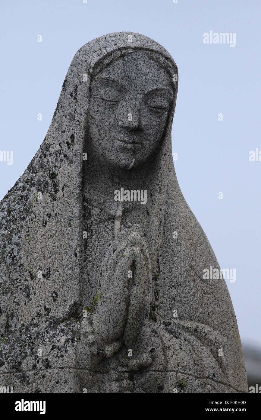 Statue of Mary out of a solid block of granite Stock Photo Alamy