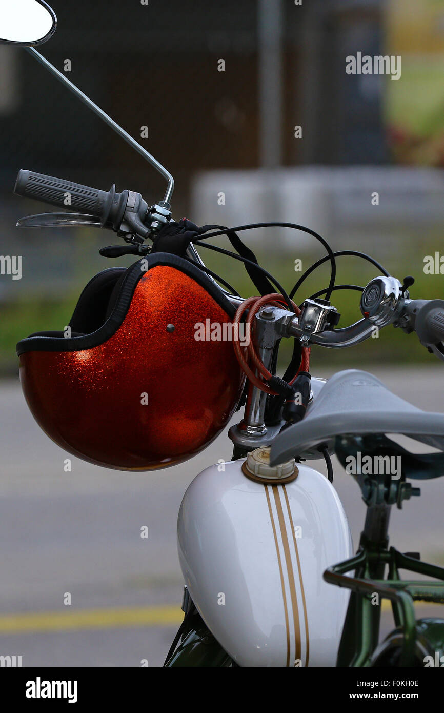 Vintage classic moped and red helmet Stock Photo Alamy