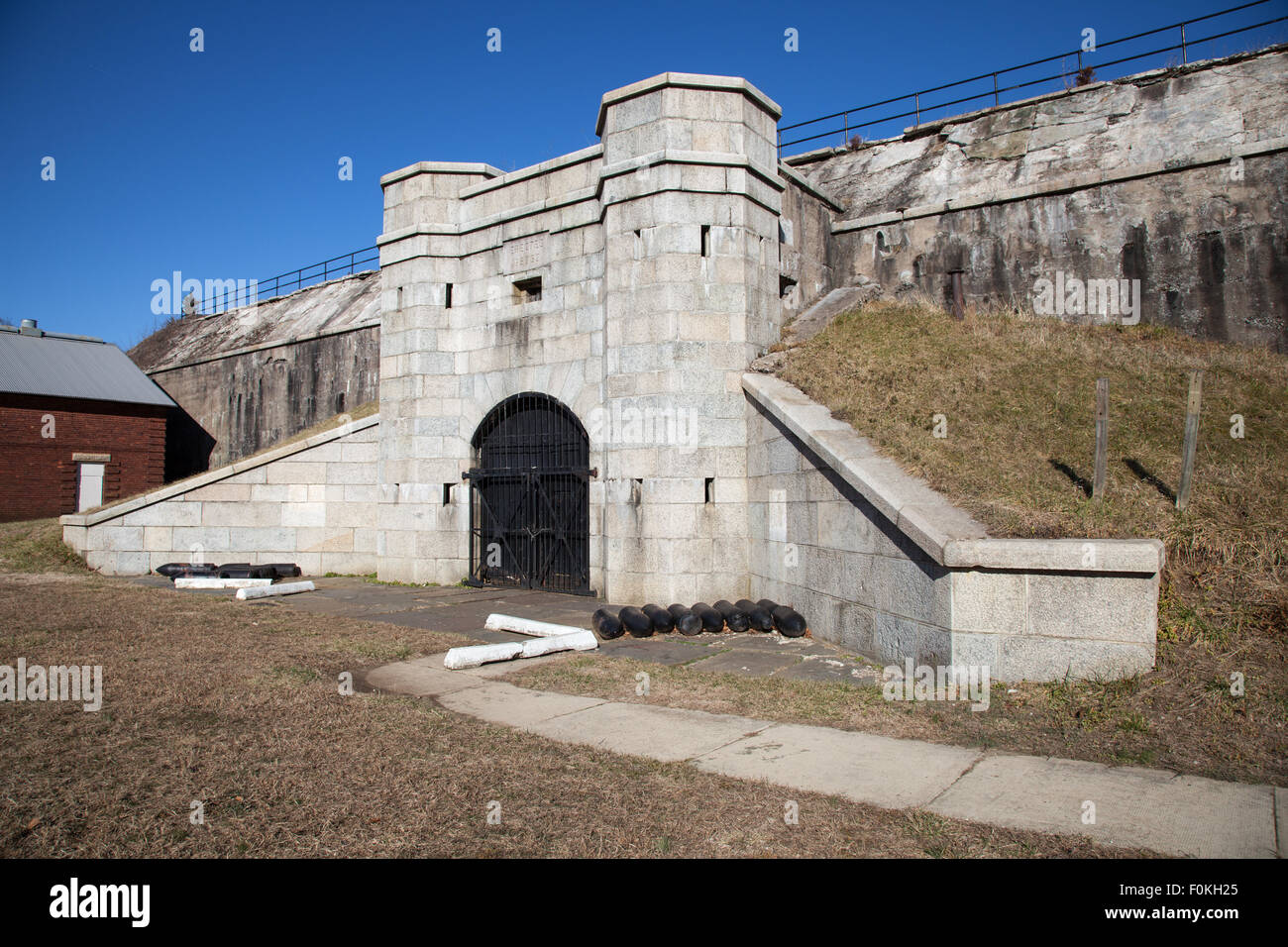 Disappearing gun battery from 1892 that used hydraulics to lift guns above protective wall.  Fort Hancock, New Jersey. Stock Photo