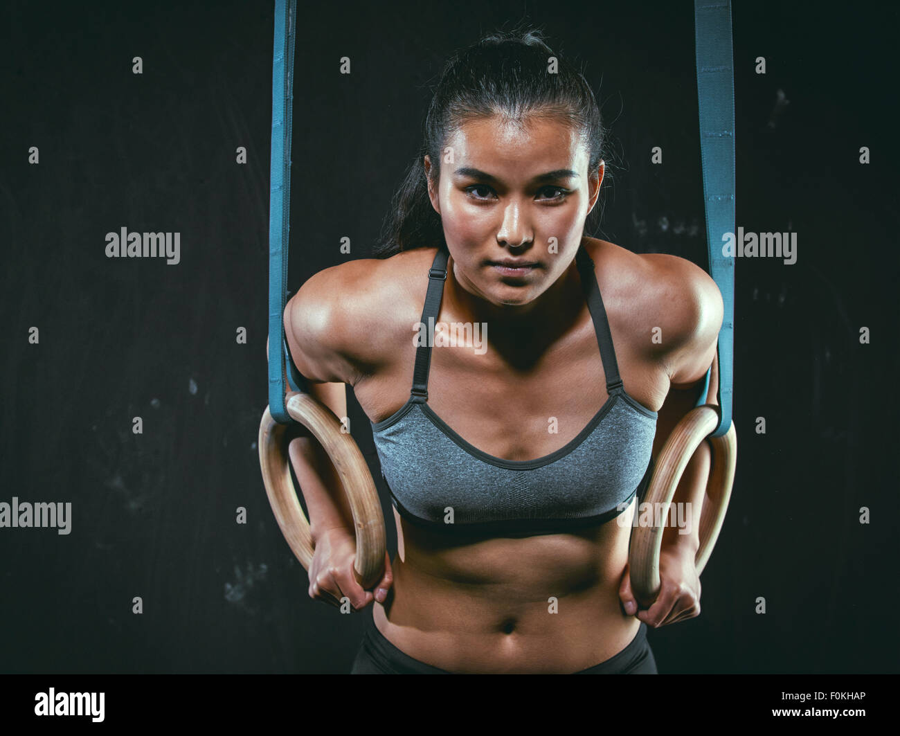 Portrait of CrossFit athlete with gymnastic rings Stock Photo Alamy