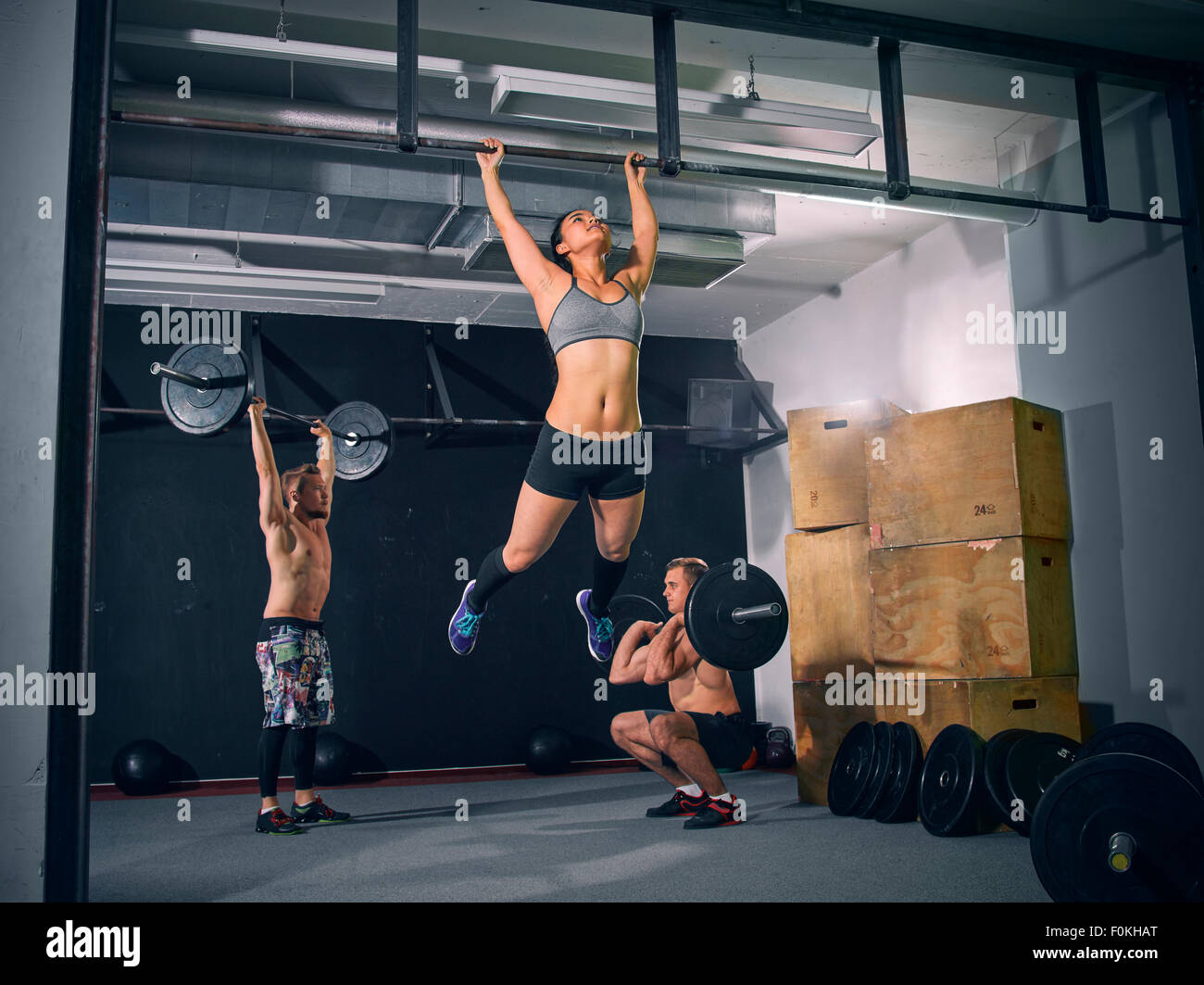 Three CrossFit athletes at workout Stock Photo Alamy