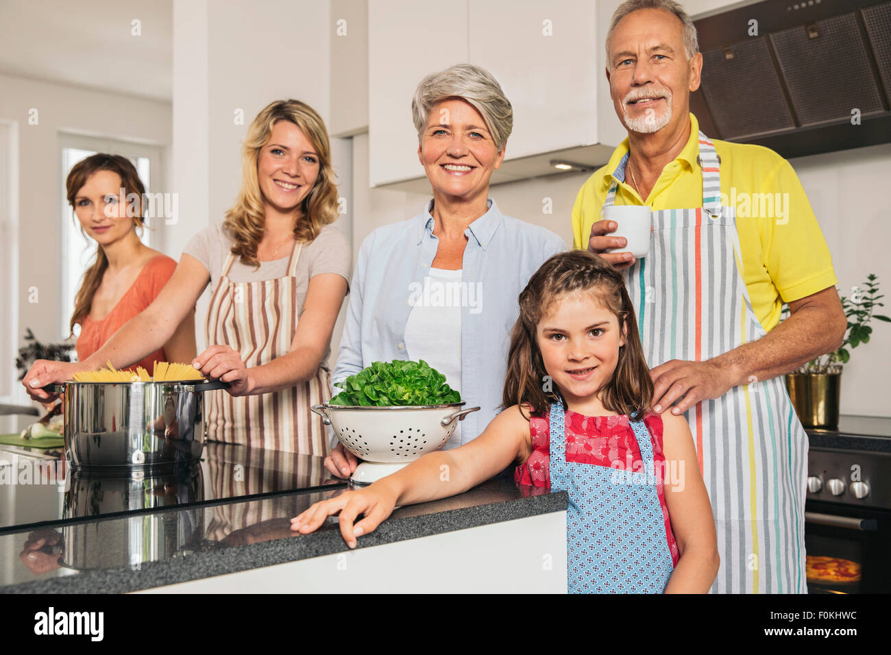 Portrait of extended family in the kitchen Stock Photo