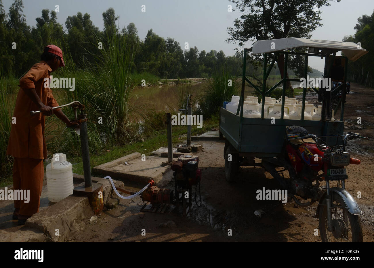 Pakistani water suppliers collecting water from the canal near Lahore