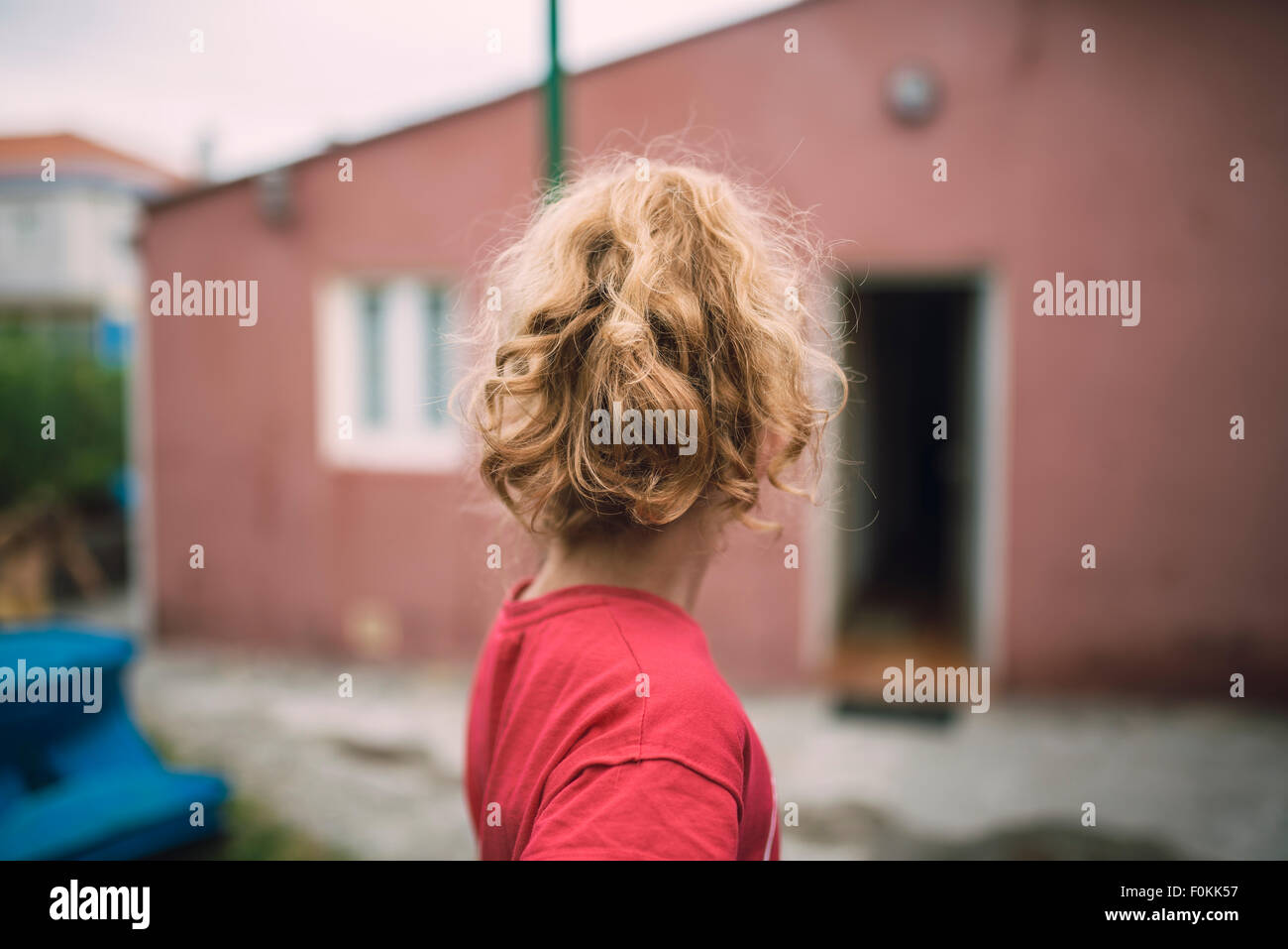 Back view of blond little girl Stock Photo - Alamy