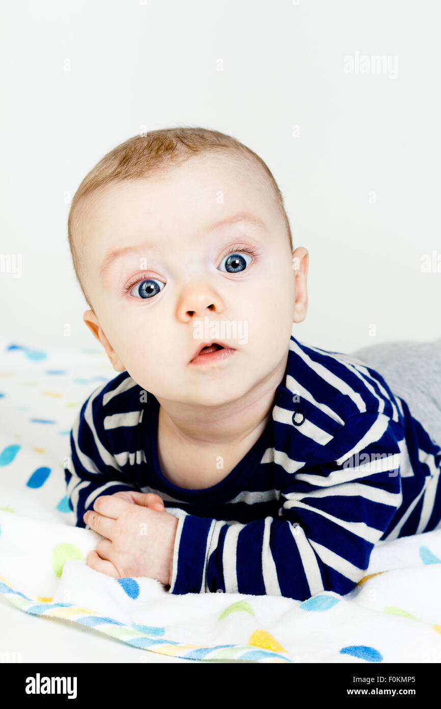 Adorable baby with blue eyes. studio photo Stock Photo Alamy