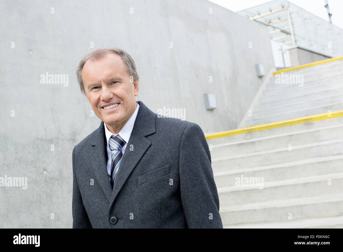 Portrait of confident businessman outdoors Stock Photo - Alamy