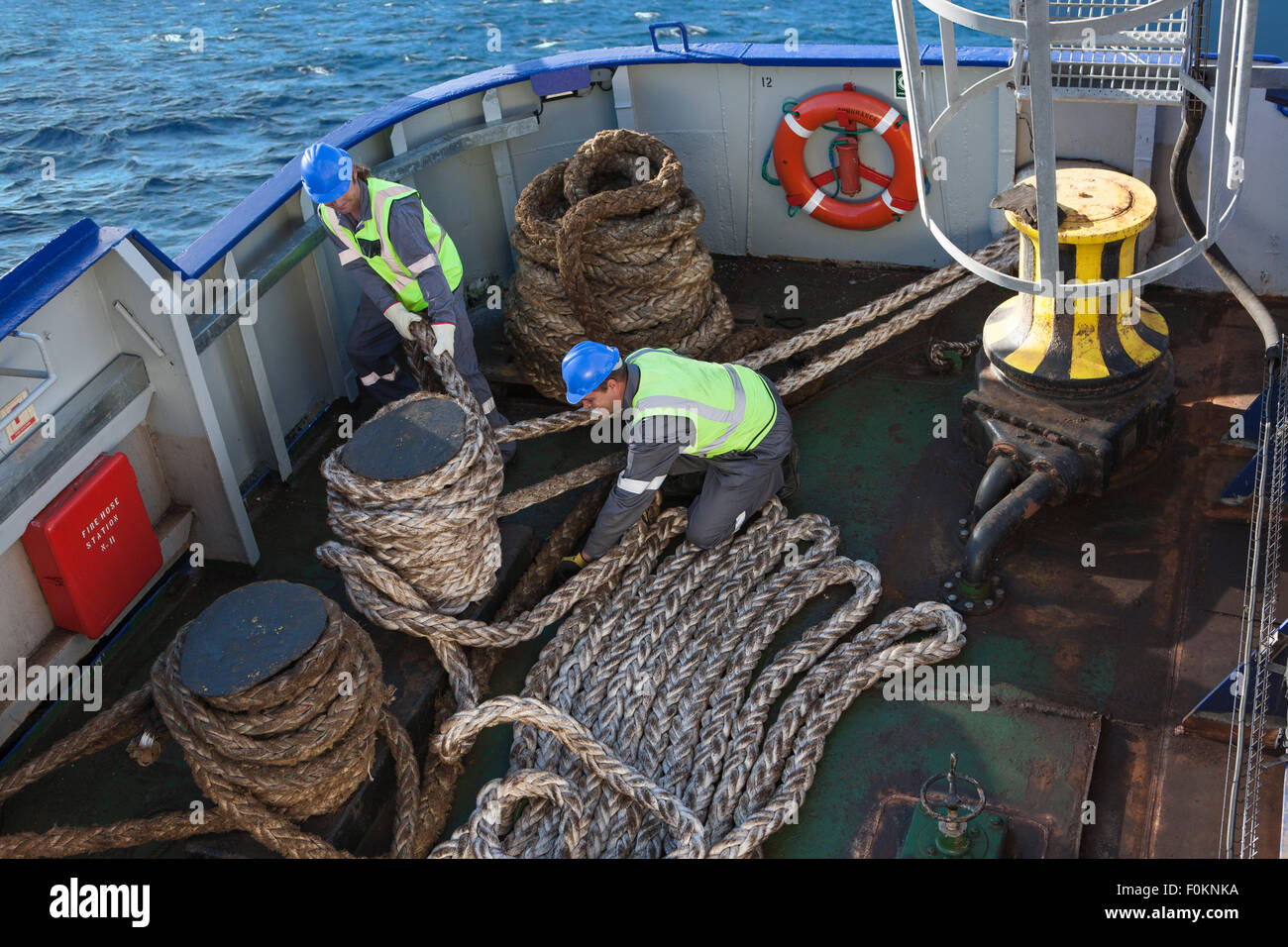 Crew working onboard a ship Stock Photo Alamy