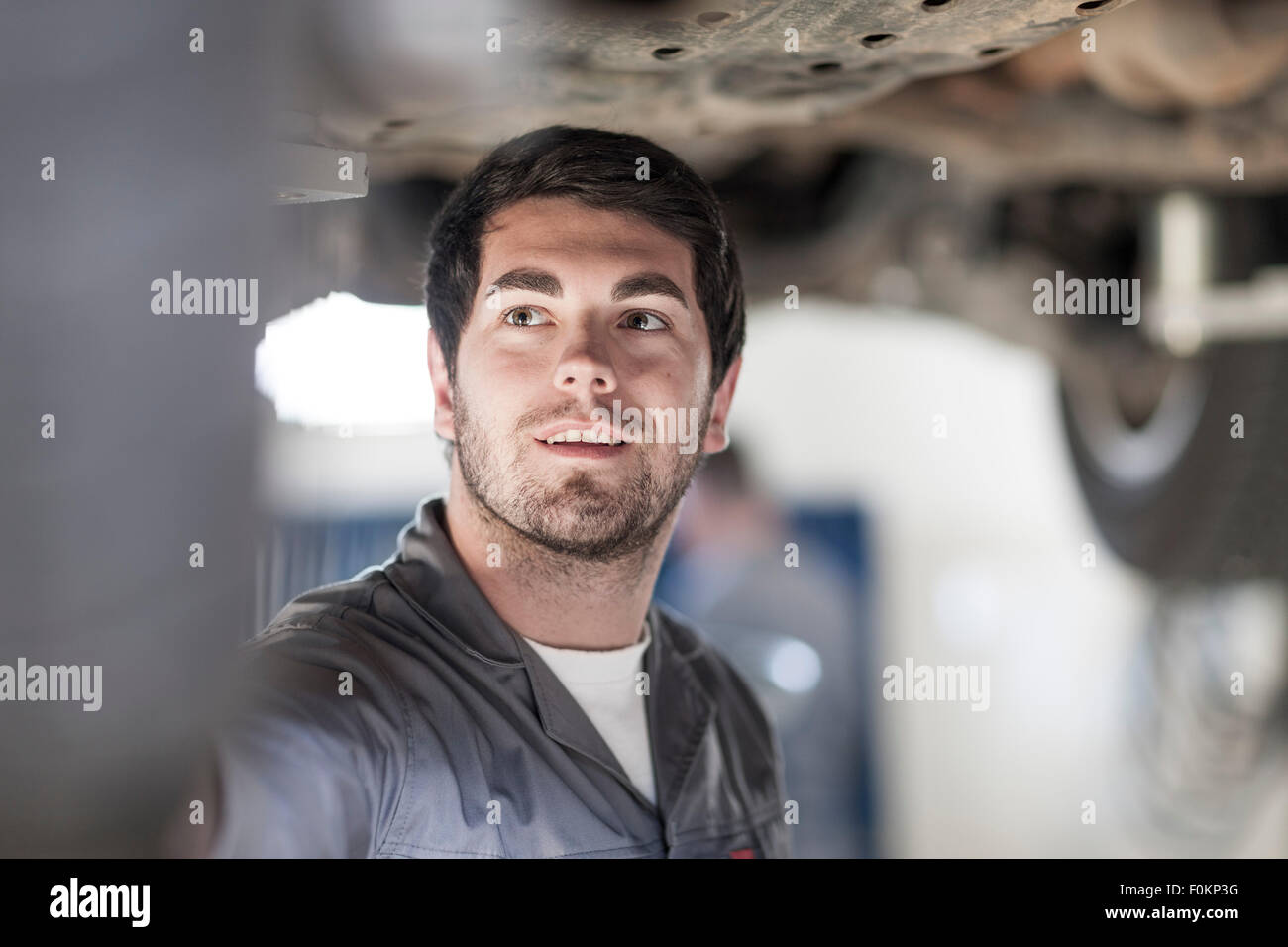 Car mechanic at work in repair garage Stock Photo Alamy