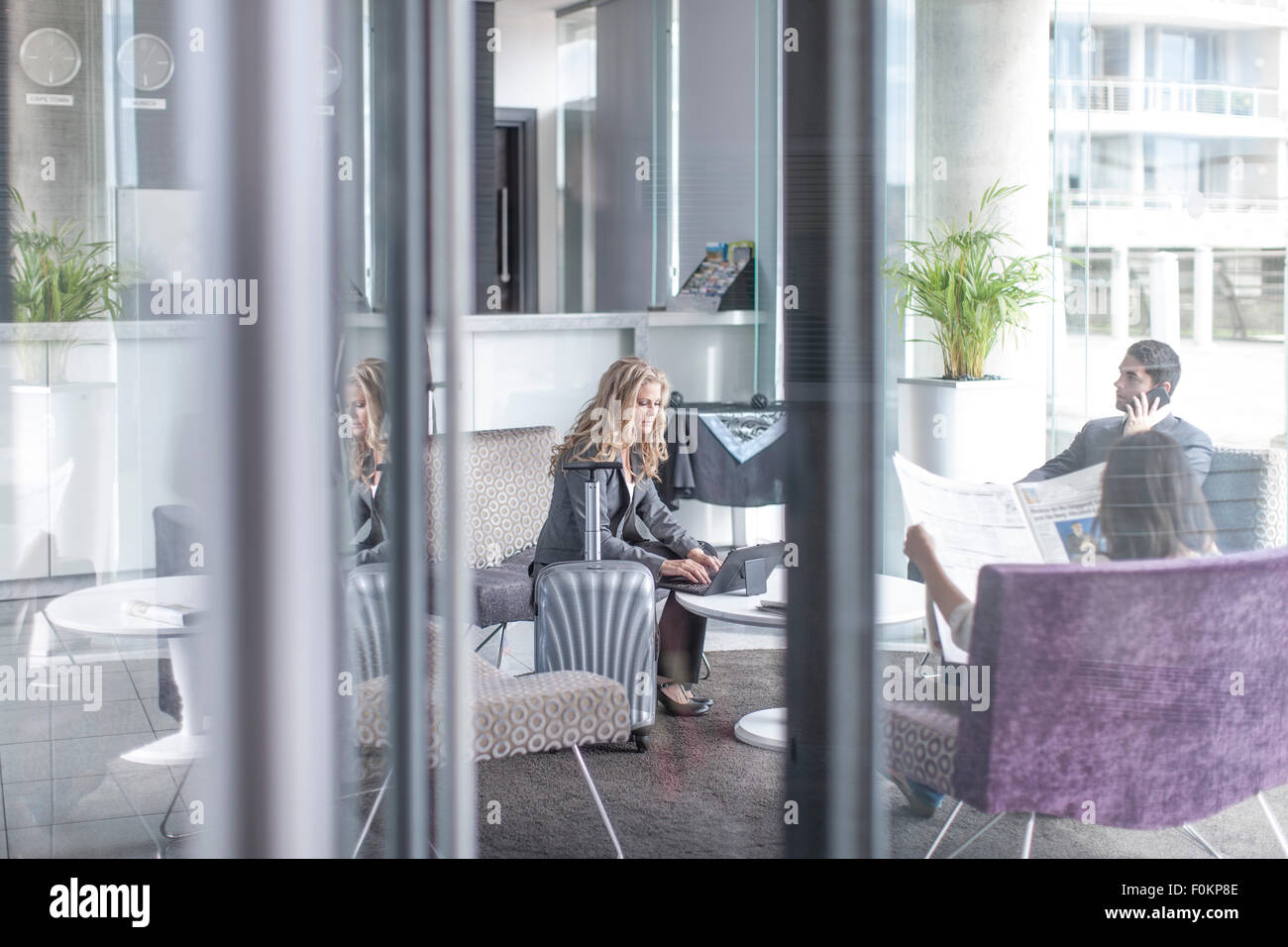 Business people in a hotel lobby Stock Photo - Alamy