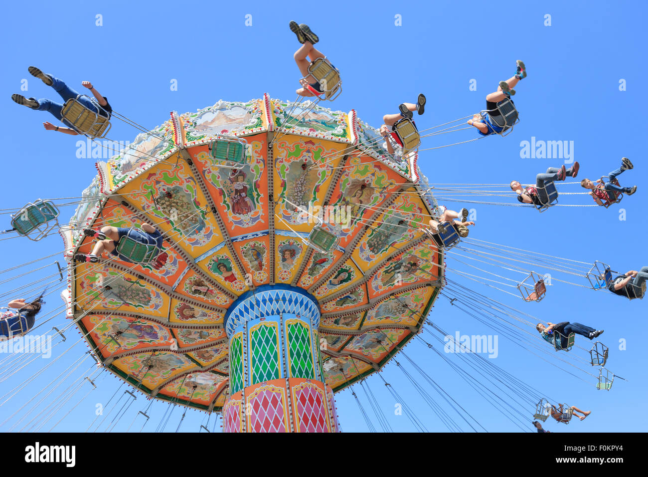 People ride the Wave Swinger at the Ohio State Fair in Columbus, Ohio. Stock Photo