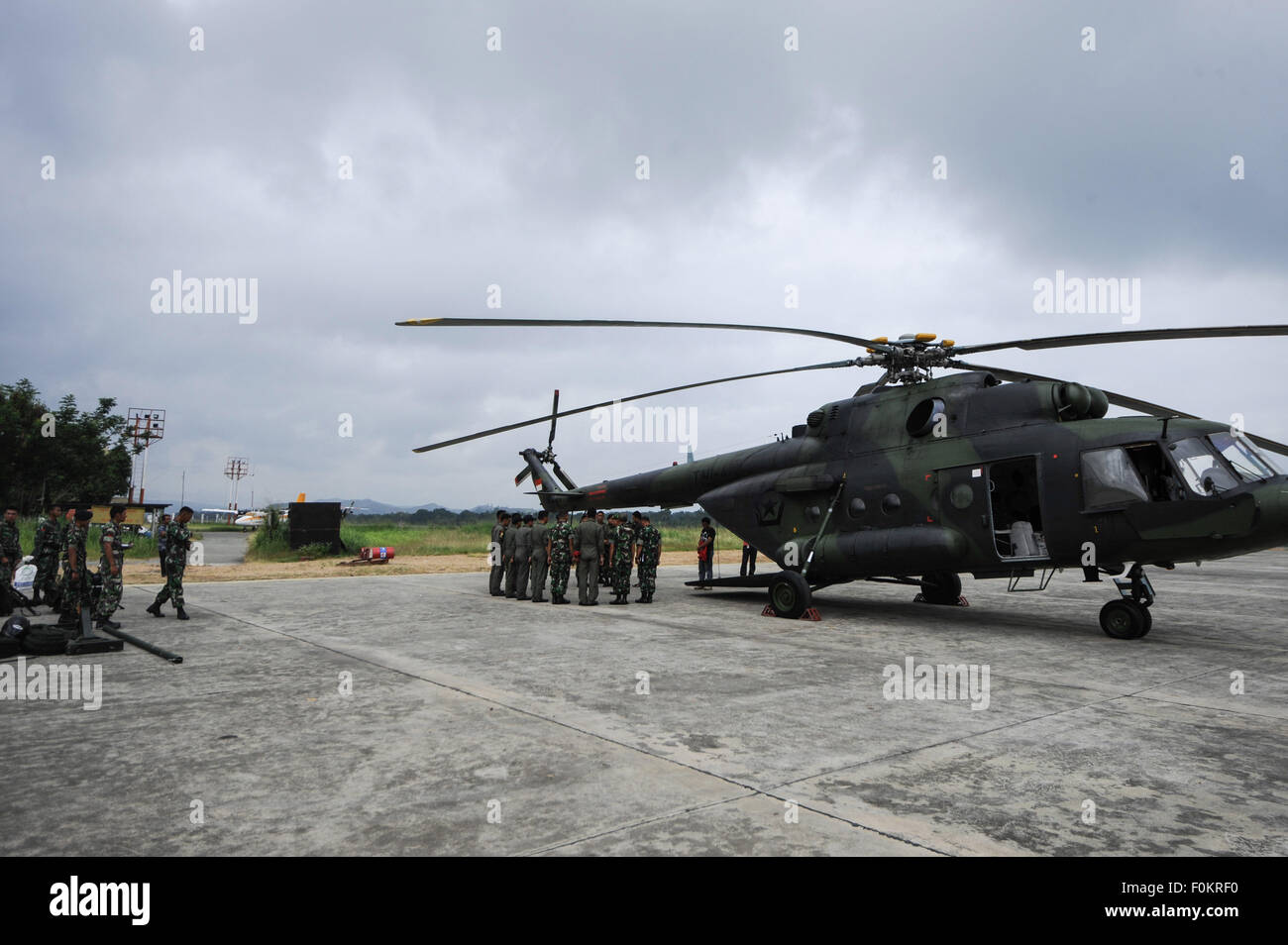 Jayapura, Indonesia. 18th Aug, 2015. Soldiers prepare to leave for the Trigana Air Service flight's crash site for rescue operations, at an air base in Jayapura, Indonesia, Aug. 18, 2015. Credit:  Veri Sanovri/Xinhua/Alamy Live News Stock Photo