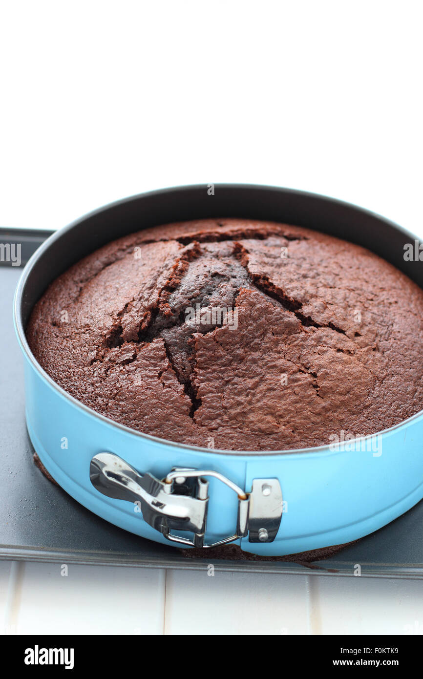 Freshly baked chocolate with crack on the cake Stock Photo Alamy