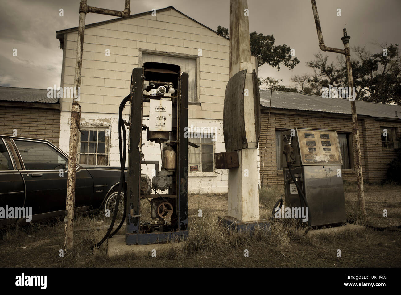 Old retro gas pumps in the rural landscape in Utah Stock Photo