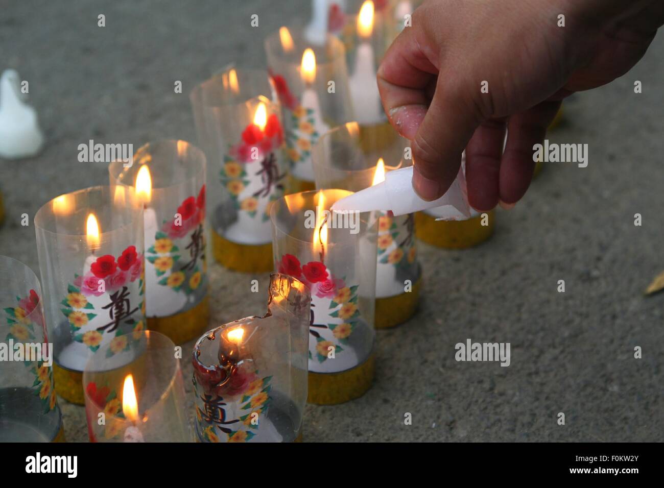 Tianjin, China. 18th Aug, 2015. A mourning ceremony is held for the victims of the massive warehouse explosions at Taida Hospital near the explosion site in Tianjin, north China, Aug. 18, 2015. The death toll from last week's massive blasts in Tianjin rose to 114. Credit:  Chen Yichen/Xinhua/Alamy Live News Stock Photo
