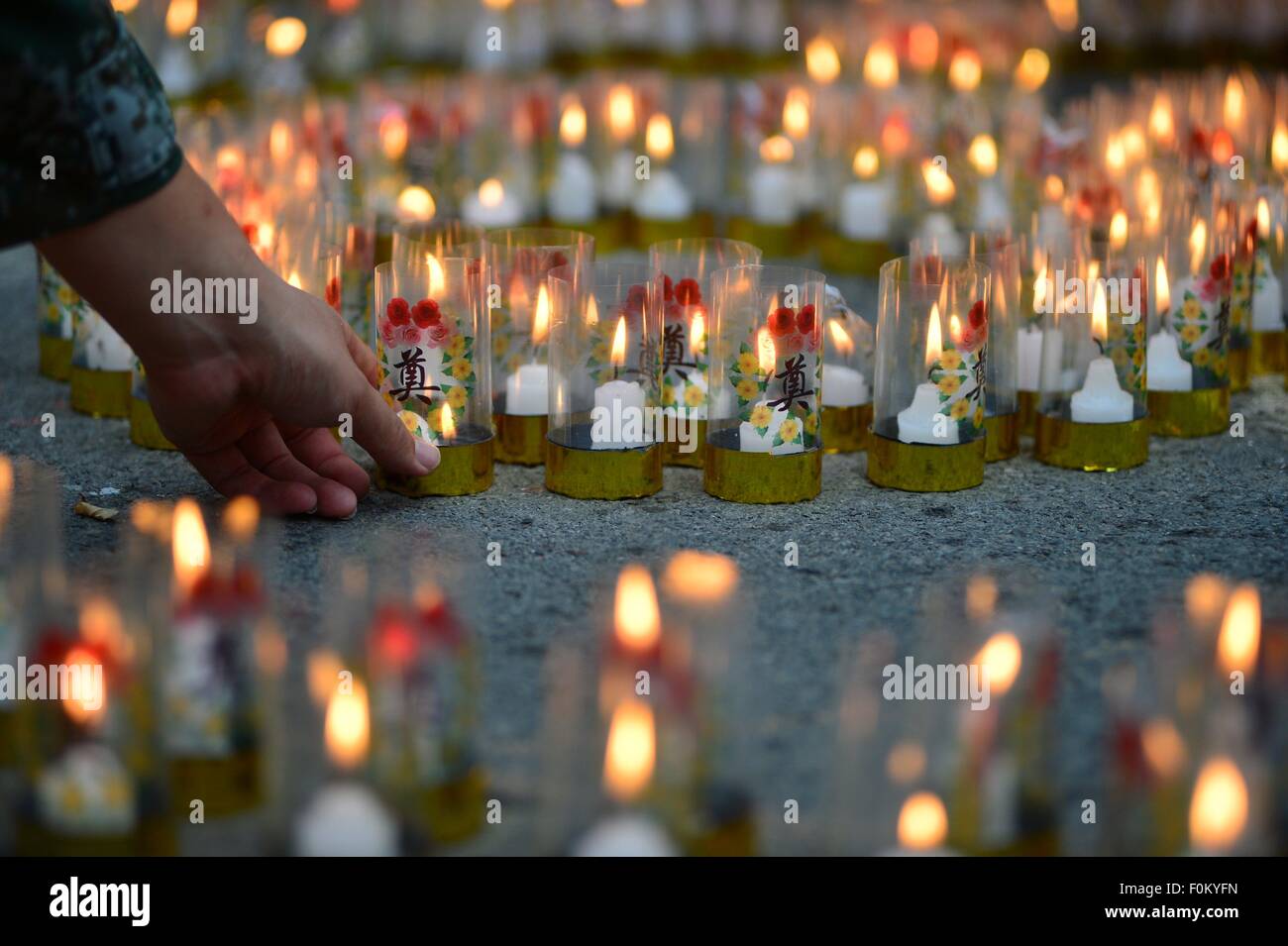 Tianjin, China. 18th Aug, 2015. A mourning ceremony is held for the victims of the massive warehouse explosions at Taida Hospital near the explosion site in Tianjin, north China, Aug. 18, 2015. The death toll from last week's massive blasts in Tianjin rose to 114. Credit:  You Sixing/Xinhua/Alamy Live News Stock Photo
