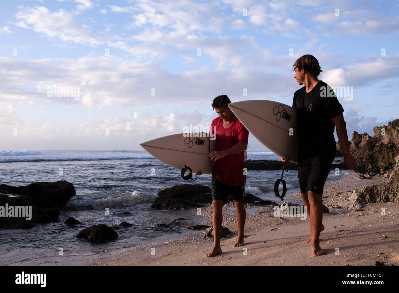 Surfers, Big Swell, Bali Stock Photo