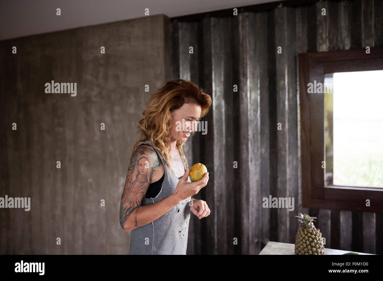 Martina Cerna, Woman with tattoos, Shipping container home, Bali expat Stock Photo