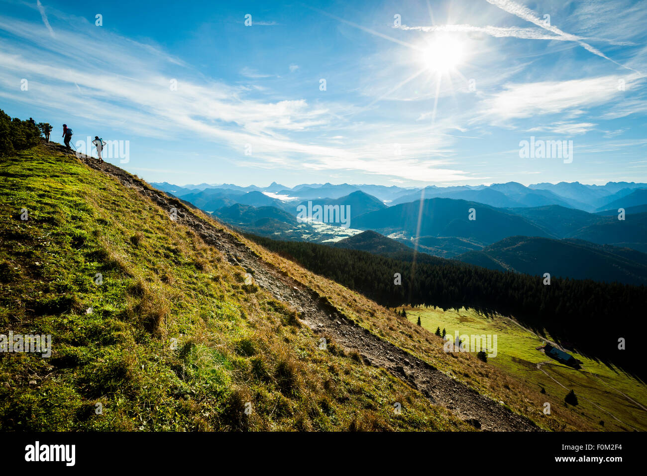 Hikers on the Jochberg, Bavarian foothills, Bavaria, Germany Stock Photo