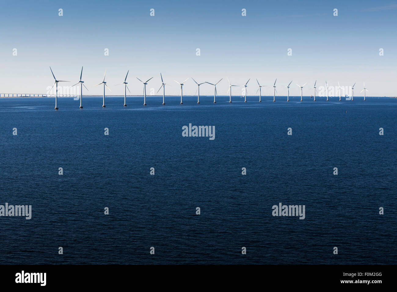 Wind Park and Øresund bridge in the Øresund, Copenhagen, Denmark Stock Photo