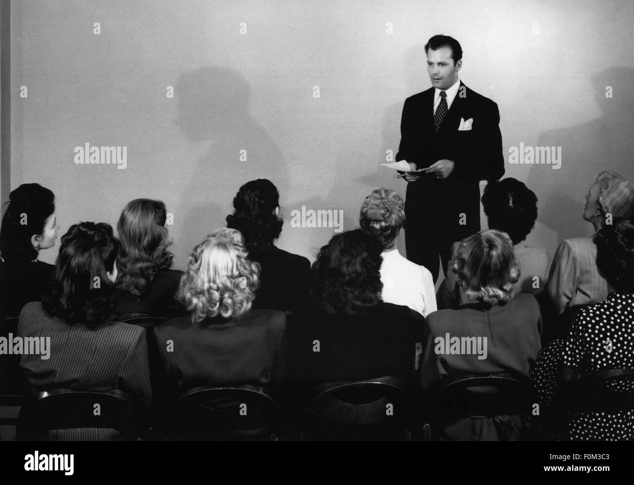 pedagogy, school / lessons / discipline, man holding lecture in front of group of women at an evening class, 1950s, Additional-Rights-Clearences-Not Available Stock Photo