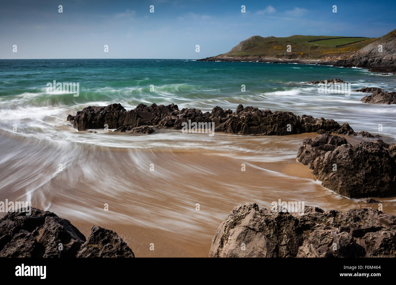 The rugged coast around Worm's Head and Fall Bay on the Gower ...