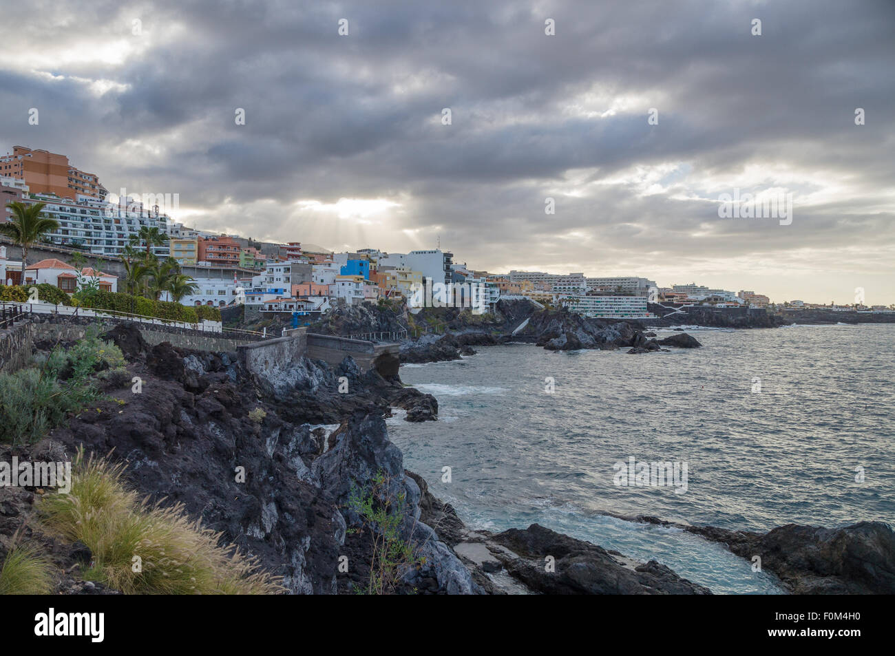 Cloudy weather in coastal resort town Puerto de Santiago, Tenerife, Canary Islands, Spain Stock Photo
