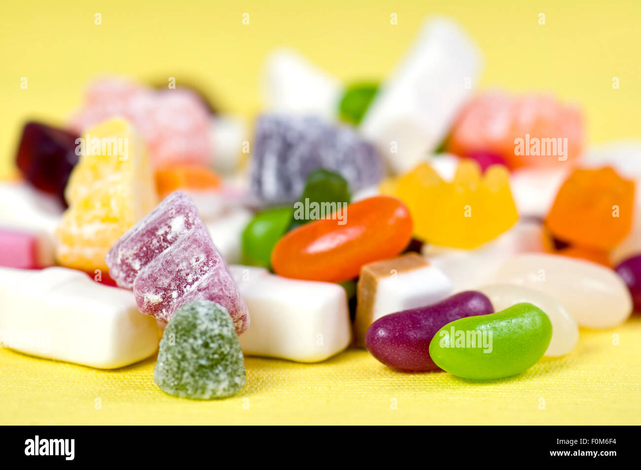 Mixture of childrens sweets including gummy bears, jelly beans, dolly mixtures, jelly babies and milk bottles Stock Photo