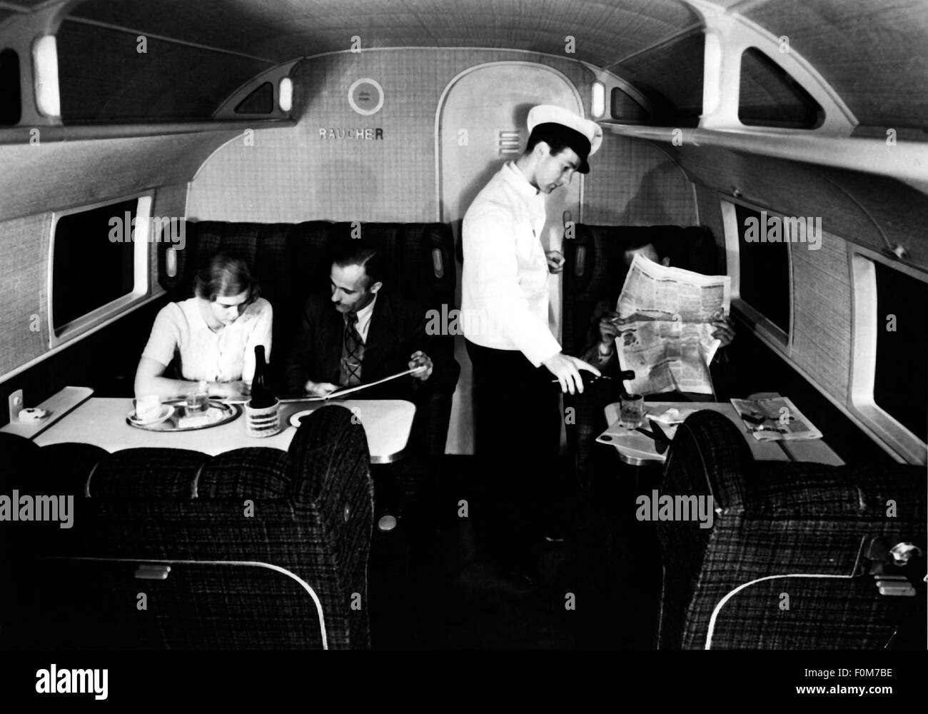 transport / transportation, aviation, steward servicing guests in Junkers JU 90, Additional-Rights-Clearences-Not Available Stock Photo