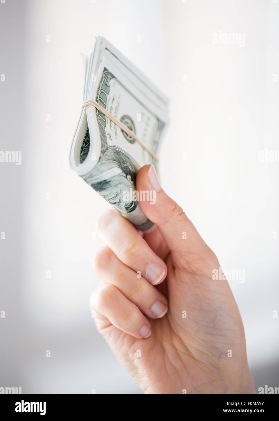 close up of woman hands holding us dollar money Stock Photo